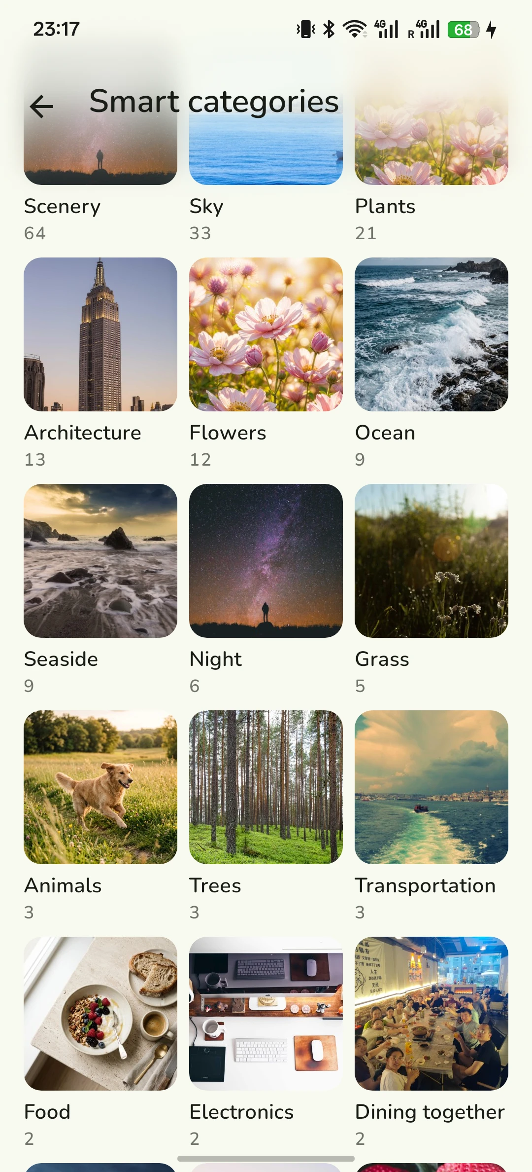 Smart categories screen grouping photos into Scenery, Sky, Plants and more, each with a cover and a photo count